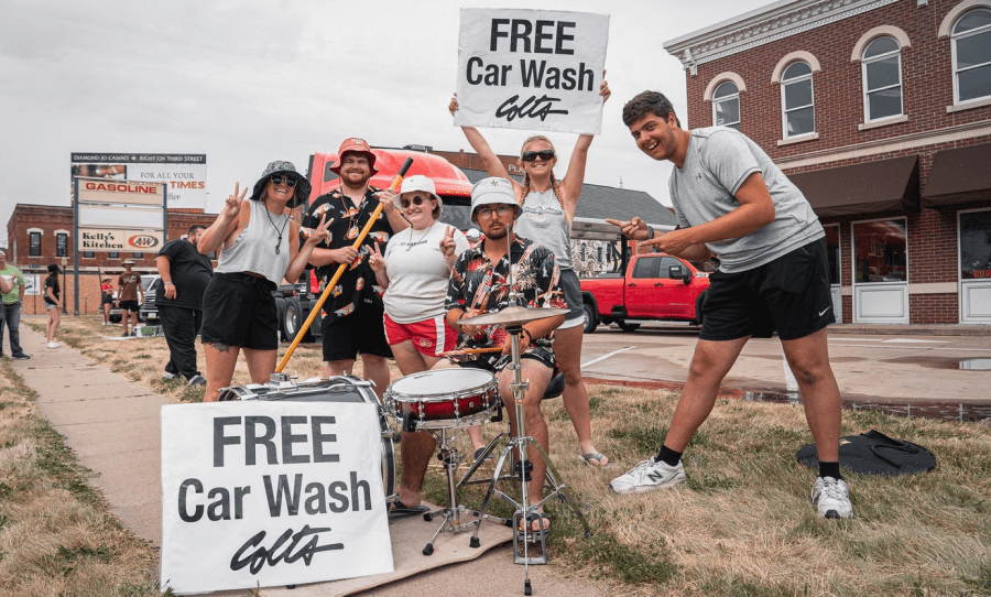 Photo of Colts and Colt Cadets members at their car wash site